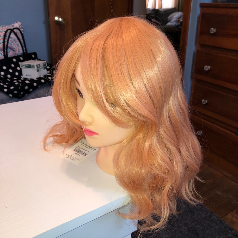Light pink orange tint wavy wig